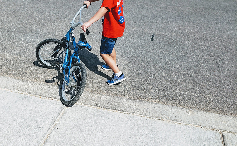 Child with a bike