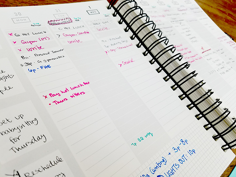 Get to Work Book Planner with notes for the week written in.