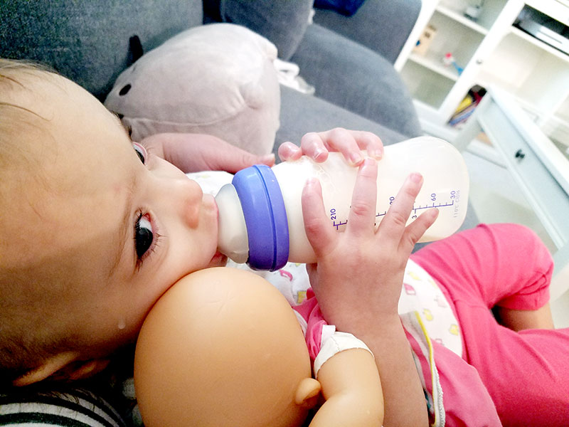 Baby with a bottle.
