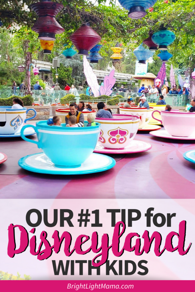 Pin image reading Our number one tip for Disneyland with kids with an image of the teacup ride under the text
