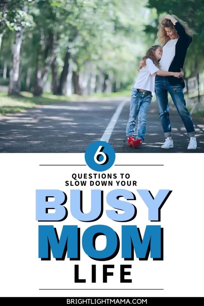 Mother and daughter smiling with overlaid text reading 6 questions to slow down busy mom life