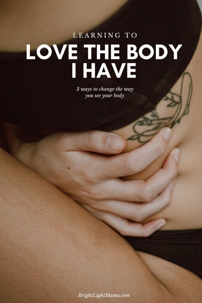 Title image for a post called I Hate My Body, Accepting Your Imperfect Body As-Is, featuring a woman holding her hands over her bare stomach